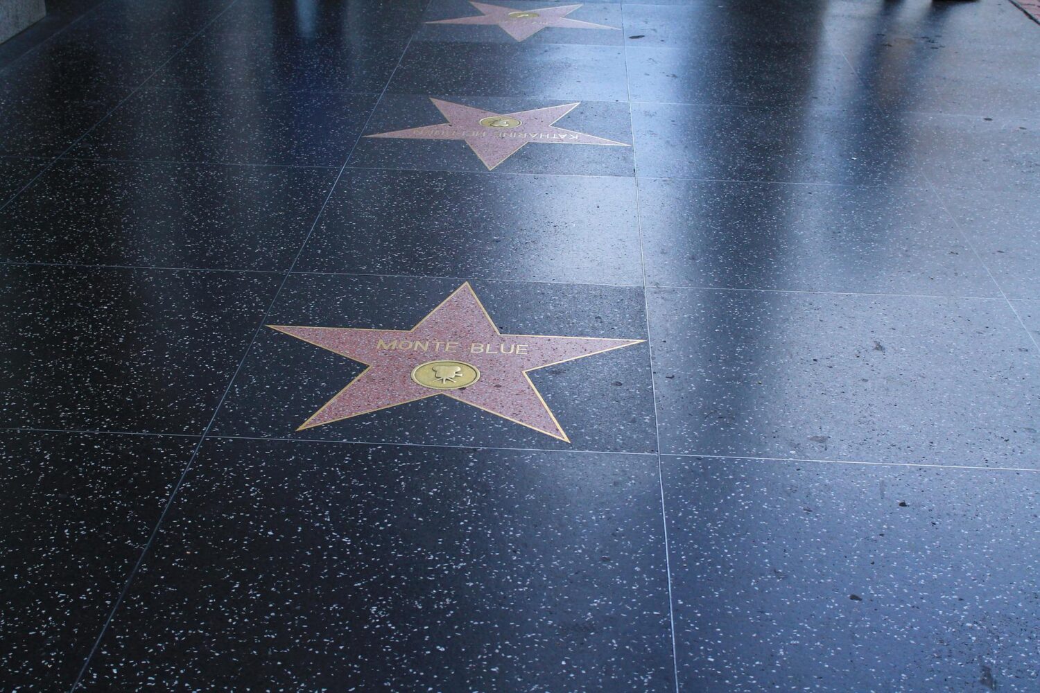 Walk of fame stars with black flooring