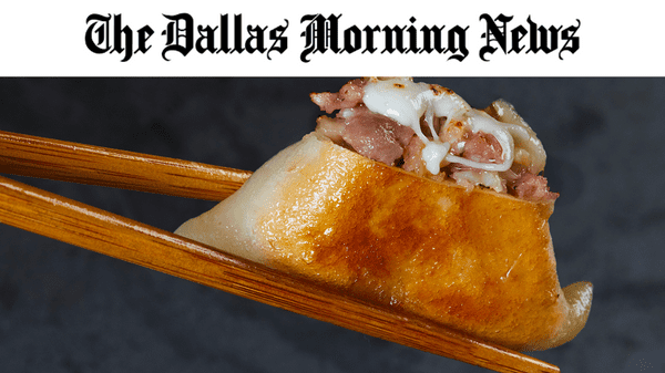 Chopsticks holding a dumpling, the words Dallas morning news above 
