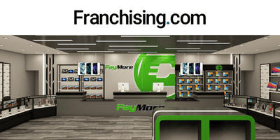Inside of a PayMore store, franchising.com in black font above