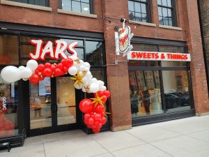 Jars flagship location storefront during Grand Opening ceremony.