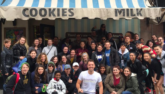 schmackarys cookie franchise in nyc with team in front of iconic nyc location