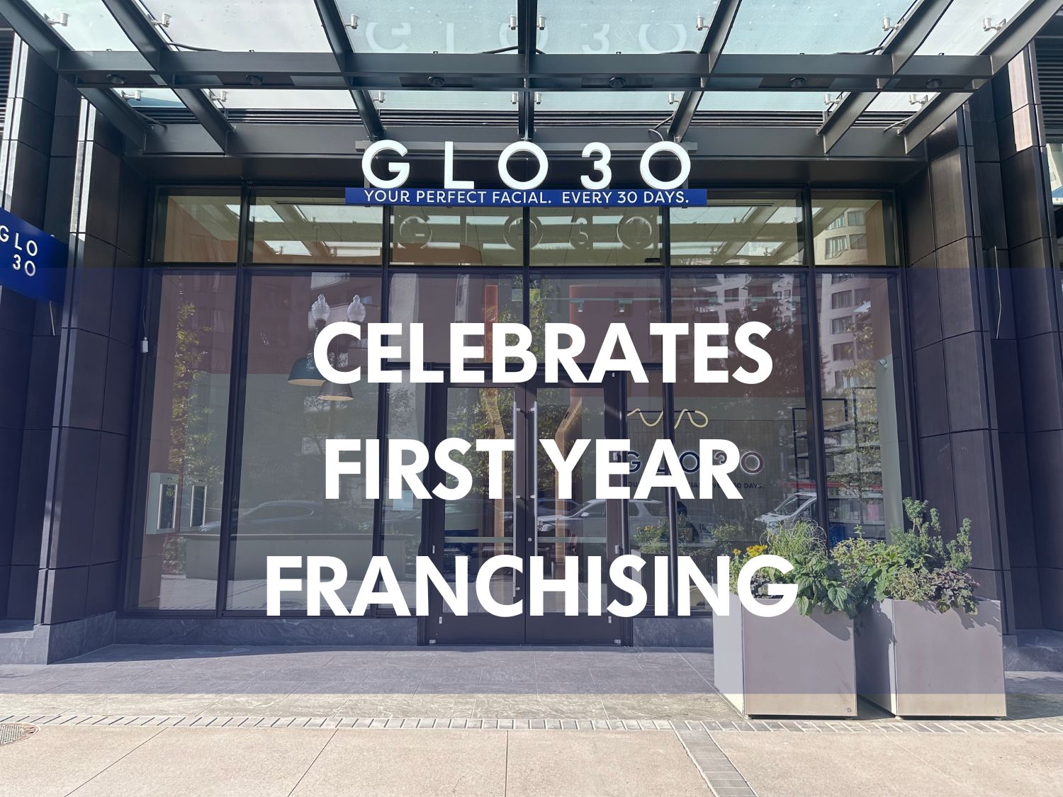 Graphic showing the front of GLO3O's national landing location with text across the frot showing "Celebrates First Year of Francising"